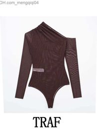 Women's Polos TRAF 2023 Women's Tulle Asymmetrical Skin-tight garment Fashion One Shoulder Long Sleeve Retro Backless Slim Bodysuit Z230713