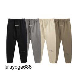 2023 New Fashion Mens Designer Pants ESS Men Women Solid Color Pant Trousers Motion For Male Casual Joggers Size pants