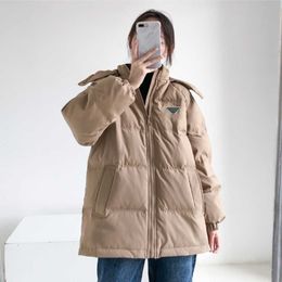 Autumn and winter ladies hooded thick loose down coat, 90% white duck down filled soft and warm, cuff tightening no air leakage.