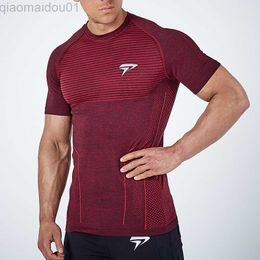 Men's T-Shirts 2021 New Men Running Tight Short T-shirt compression Quick dry t shirt Male Gym Fitness Bodybuilding jogging Tees Tops clothing L230713