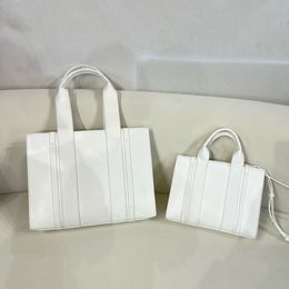 Leather textured Tote Bag design a unique luxury high-grade high capacity daily handbag vertical leather stripes calfskin embroidery