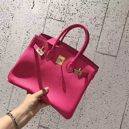 Platinum Luxurys Leather Handbag Rose Red Bag 2024 Fashion Versatile Togo Litchi Pattern Bridal Bag