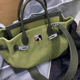 Leather Bag Platinum Handbag Luxurys Canvas Top 2024 Autumn and Winter Womens Niche Ins One Shoulder Military Green Crossbody Carrying