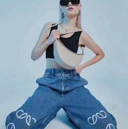 Designers Jeans femininos Chegamentos de cintura alta Holdou Patch Bordado Decoração Casual Blue Straight Fashion Luxur