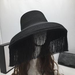Wide Brim Hats 202307-shi Summer Drop Chic Holiday Tassel Mysterious Mask Paper Grass Lady Sun Cap Women Leisure Hat