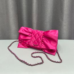 Designer Pink/Black Satin Bowknot fuchsia satin clutch bag with Silver Metal Hardware, Matelasse Chain, Turn Lock, Soft Shoulder Strap, and Lipstick Purse - Perfect for Parties and Luxury Occasions (22cm)