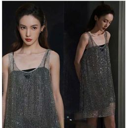 Summer ladies halter vest dress, loose two sets of sexy hollow skirt, simple and casual style, slim fashion, star with the same style.