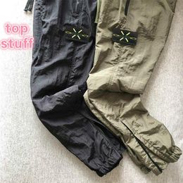 19ss Top nylon mens pants brand travel retro sweat pants details metal nylon mesh breath loose feet ykk zipper shrink trousers for344F