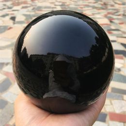 2020 1pcs Natural heavy Natural Black Obsidian Sphere Large Crystal Ball Healing Stone Foe Home Decoration317i