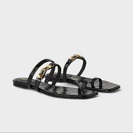 Toteme designer black crocodile flops flip patterned flat for bottom casual and versatile use. New Spring/Summer 2023 beach sandals