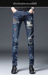 Jeans da uomo Slim Fit ricamo piccolo piede marchio di moda pantaloni elastici a gamba dritta piccoli pantaloni casual versatili di fascia alta per uomo
