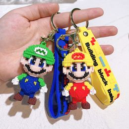 Wholesale building doll key chain small gift car accessories PVC cartoon key chain cartoon bag pendant