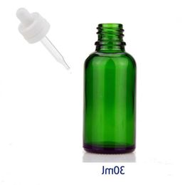 Hot Selling Serum Cosmetic 30ml Round Glass Dropper Bottle 1OZ Essential Oil Container with Childproof Cap Ixhbf