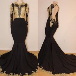 2019 African Black and Gold Mermaid Prom Dresses High Neck Gold Lace Appliques See Through Open Back Long Sleeves Evening Gown292p