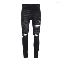 Jeans da uomo Uomo MX1 DISTRESSED DENIM ITALIANO SKINNY Pantaloni elasticizzati slim fit strappati Pantaloni Hip Hop distrutti con fori rotti