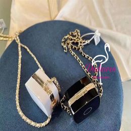 party gift double-C Fashion earphone Organisation metal bin with chain as necklace classic Earphones Charging cover powder compact209B