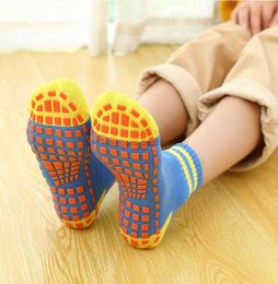 Wholesale Children Adults Yoga socks Jump Trampoline Sports Grip sock Non Slip Socks for Parent and kids Indoor home Silicone sole floor sox