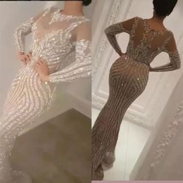 Yousef Aljasmi 2020 Luxury Long Sleeve Sequined Mermaid Prom Dresses Sexy Sheer Jewel Neck Evening Wear Beads Celebrity Prom Gowns232k