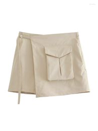 Skirts YENKYE 2023 Women Fashion Buckle Belt High Waist Mini Skirt Vintage Pocket Hem Asymmetric Female Safari Style Summer