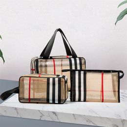 Portable simple mesh lattice cosmetic bag portable travel waterproof wash PVC striped large capacity storage box275D