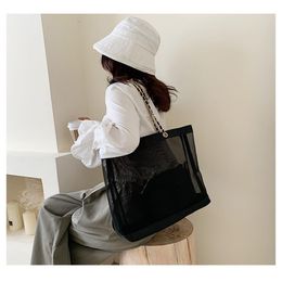 NEW Classic white printing shopping mesh chain Bag with ribbon classic Beach Travel Bag Women Wash Bag Cosmetic Makeup Storage mes213R