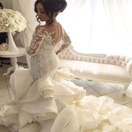 Saudi-arabische Spitze Meerjungfrau Brautkleider mit vollen Ärmeln 2019 Brautkleider Dubai Royal Train Button Rüschen Robe De Mariee3093