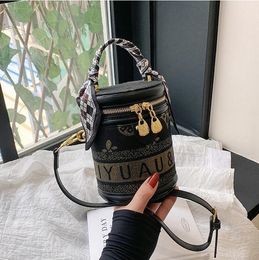 Factory outlet shoulder bag 3 colors this year's popular letter printed handbag sweet stereotypes cylinder handbags small fresh ribbon mobile phone coin purse 3518#