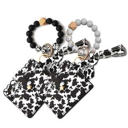 Keychains Lanyards Cursive Cow Initial Wristlet keychain with PU wallet cow print Mama Bangle keychain Sil Bangle Keyring Custom charms Gift J230724