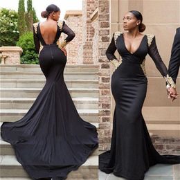 Sexy Black Evening Dresses Sexy Backless Deep V Neck Mermaid Long Formal Prom Gowns Gold Lace Applique Long Sleeves African Gowns 326n