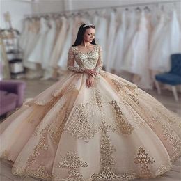 2021 Sexy Luxury Champagne Quinceanera Ball Gown Dresses Jewel Neck Lace Appliques Crystal Beads Long Sleeves Sweep Train Tiered P316W