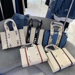 Damen Die Einkaufstasche Luxus Großhandel Geldbörsen Schulter WOODY Reisen Einkaufen Damen Umhängetaschen Große kleine Herren Strandtaschen Mode Geldbörsen Einkaufstaschen Taschen für Damen Taschen