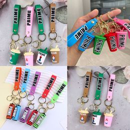 Keychains Lanyards PrimeDrink Rubber Keychain Cute Bottle Key Chains Ornament Car Bag Pendant Party Favor