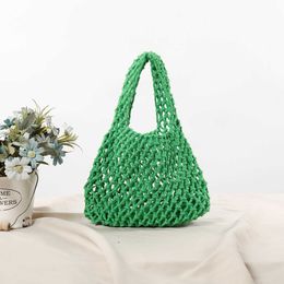 Shoulder Bags New hollowed out net bag handbag Solid color handmade woven cotton rope bag Wrist bag Beach vacation bucket bag Women's bag