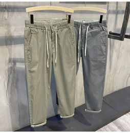Men's Pants 2023 Korean Summer Fashion Brand Loose And Versatile Cotton Button Casual 9-Point Sports Trousers Boy L85