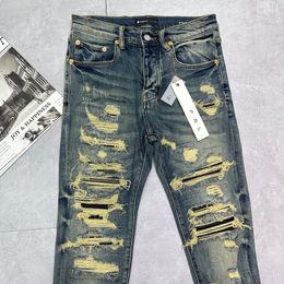 Jeans roxos retos Jeans de grife masculinos de alta qualidade Calças compridas Streetwear Jeans velhos lavados Jeans longos com furos Jeans regulares CJD2307264