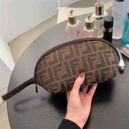 2023 New Top Design Luxury Bags high quality Travel Toiletries business trip portable storage large capacity hand holding wallet simple make-up mobile phone