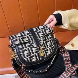 2023 Top Design Luxury Bags high quality Factory Store street trend shoulder diagonal span portable small round buckle