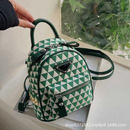 2023 Factory direct sales high quality New Mini Canvas Art Fresh Girl Backpack Versatile Crossbody Fashion Small Bag
