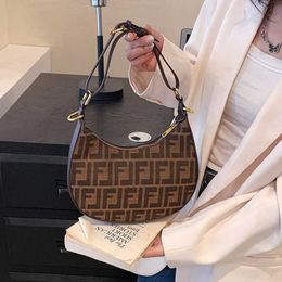 2023 Factory direct sales high quality Hot Selling Fashion Contrast Letter Splice One Shoulder Underarm Commuter Women's Bag and Elegant Hardware Decoration