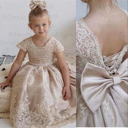 2023 Flower Girls Dresses For Wedding Champagne Short Sleeeves Satin Lace Appliques Pearls Children Kids Party Communion Gowns Ball Gown Back With Bow Sweep Train