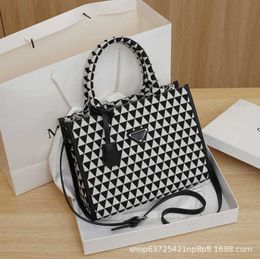 New Luxury 2023 Factory direct sales high quality Fashionable women's new high-end and stylish horizontal handbag with triangular pattern canvas tote bag trend