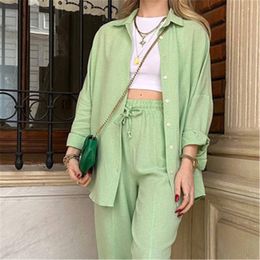 Designer two piece set women womens designer tracksuit fashion able Long-sleeved shirt with ruffled collar New simple solid Colour top + waist slimming lace-up pants