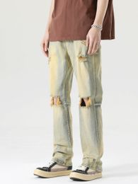 Men's designer distressed jeans, ruffled and handsome pants, loose fitting retro yellow mud distressed jeans