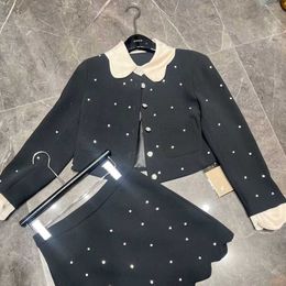 Spring and summer ladies Hepburn style high-waisted beaded suit short skirt, small fragrant wind coat high-waisted short skirt casual fashion, every day party.