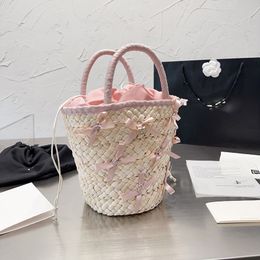 Womens Makeup Bag Luxurys Handbags Straw Grocery Basket Mini Bags Cristian Tote Delicate Bow Hardware Metal Buckle Beach Bag Princess Bag Casual Bags 21x16cm