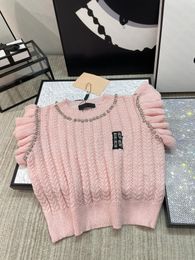 23FW Женские свитеры вязаные жилеты Дизайнерские топы с страном бисеропиточной буквы высокий роскошный бренд женский топ -рубашка рубашка рубашка эластичности.