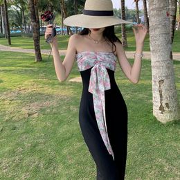 Casual Dresses French Sexy Black Flower Hanging Neck Dress 2023 Summer Slimming Temperament Show Thin Wrap Hip Sling Patchwork Beach