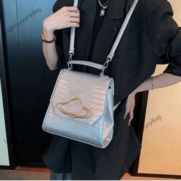 Luxury Silver Backpack Japan Vivi Designer Saturn Alligator Shoulder Bag Fashion Women Light Leather Handbags Travel Tote Bag Classic Girls School Bags 230716