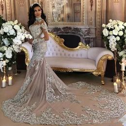 Dubai Arabic Luxury Wedding Dresses Sexy Bling Beaded Lace Applique High Neck Illusion Long Sleeve Mermaid Bridal Gowns With Long 295o