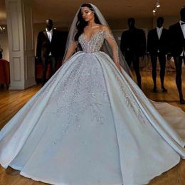 Luxurious Arabic Crystals Sequins Wedding Dresses Ball Gown 2021 Sheer Long Sleeves Bling Sparkly Dubai Garden Bridal Gowns Court 178r